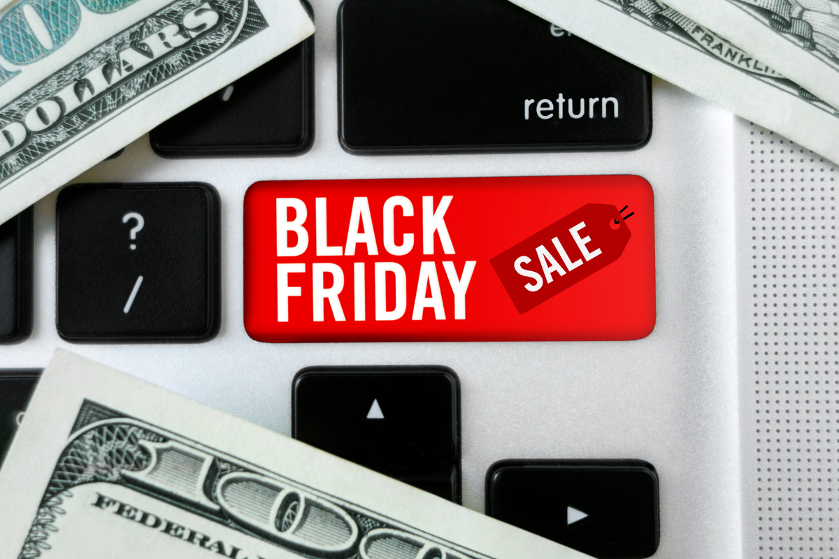 keyboard with Black Friday Sale key where the shift key is normally; money on keyboard